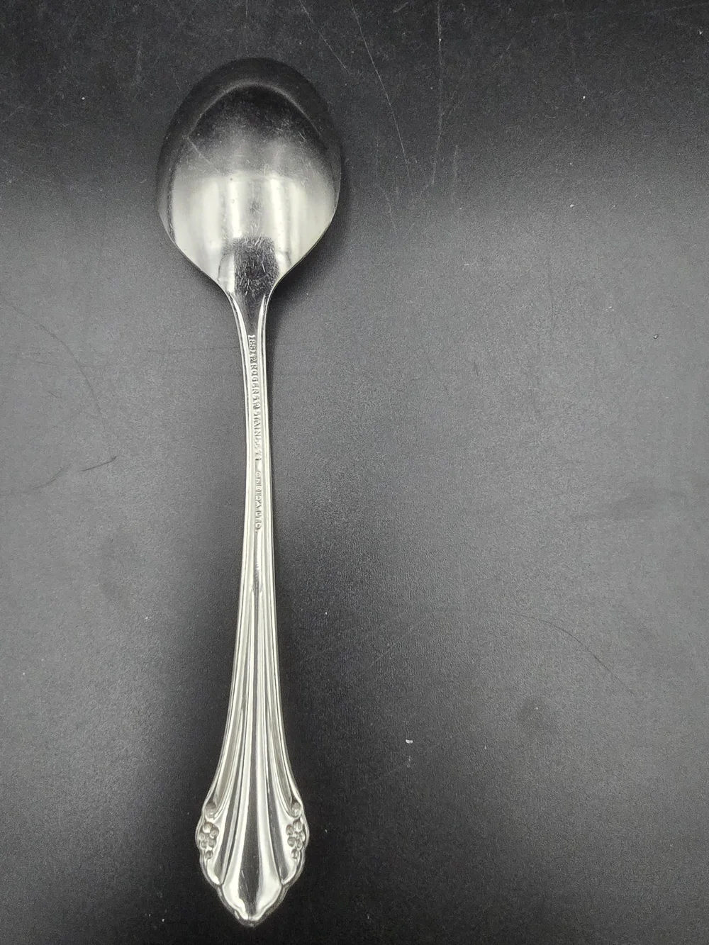 Oneida Silver Tone Ornate Handle Teaspoon